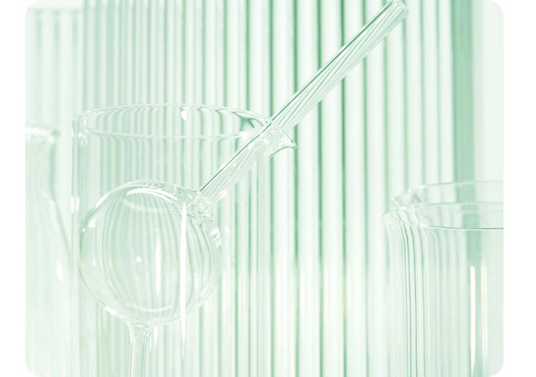 Background image containing selection of dermatologist glass vials in different shapes